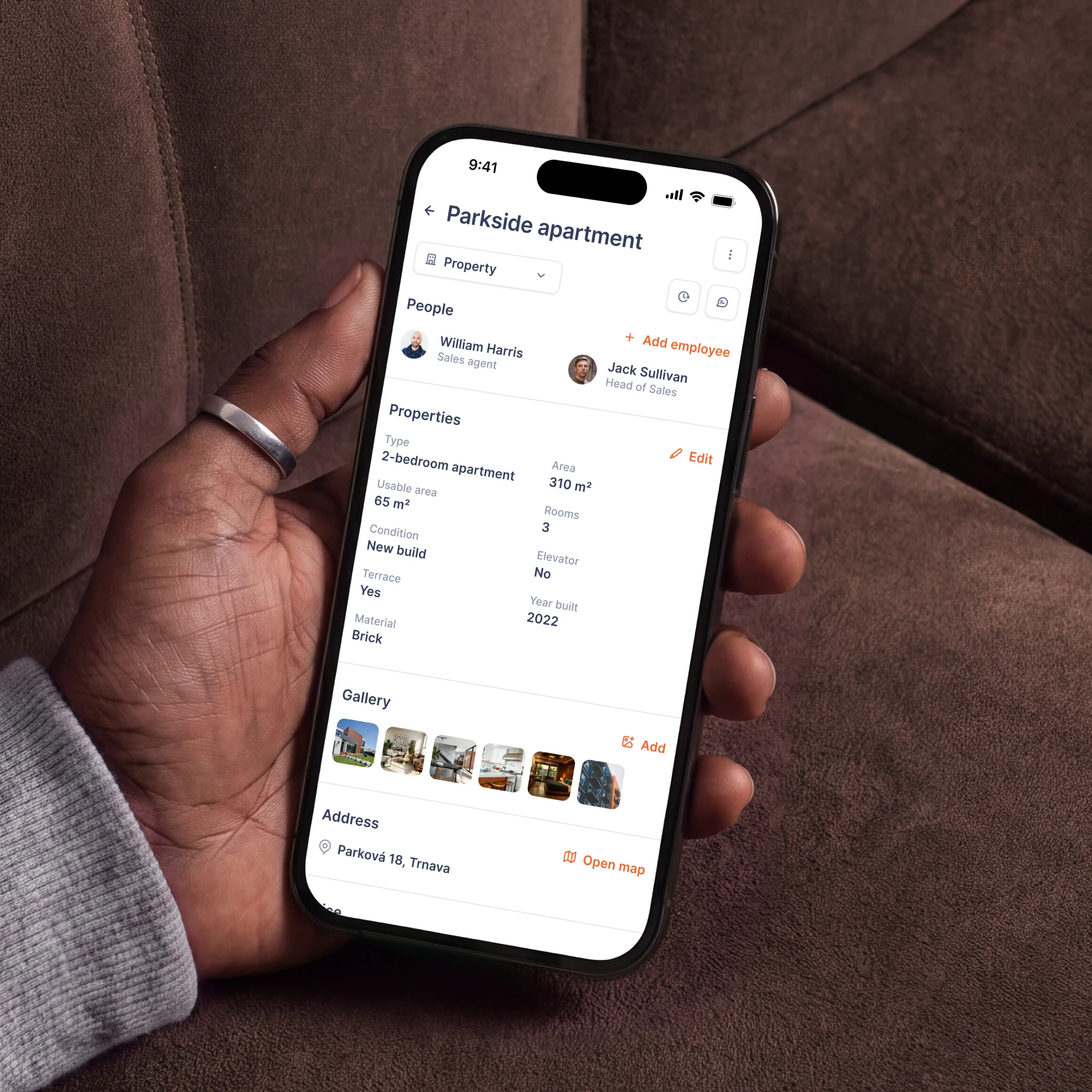 Property details and linked contacts on a mobile screen