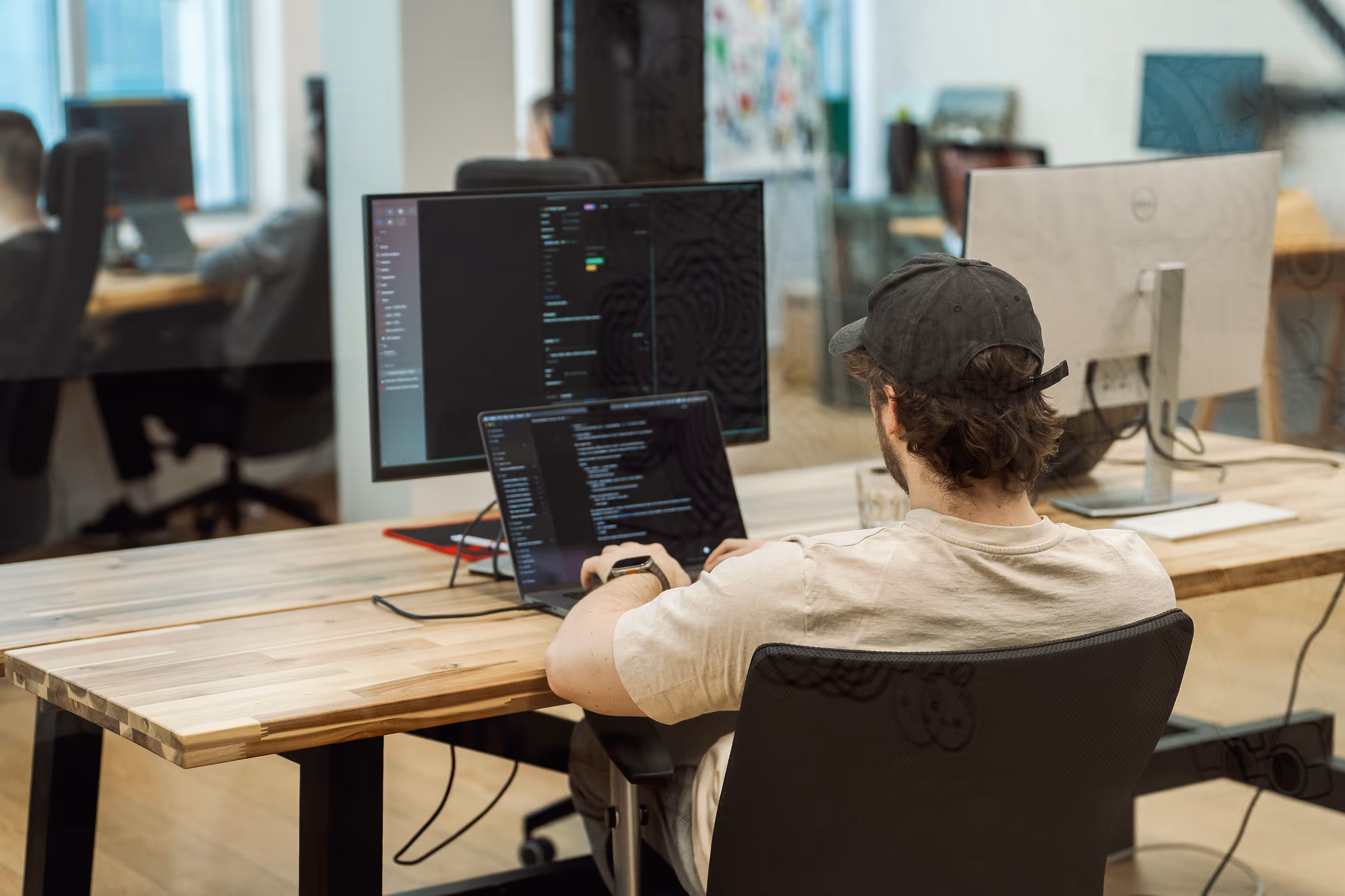 A team member working with existing desktop software