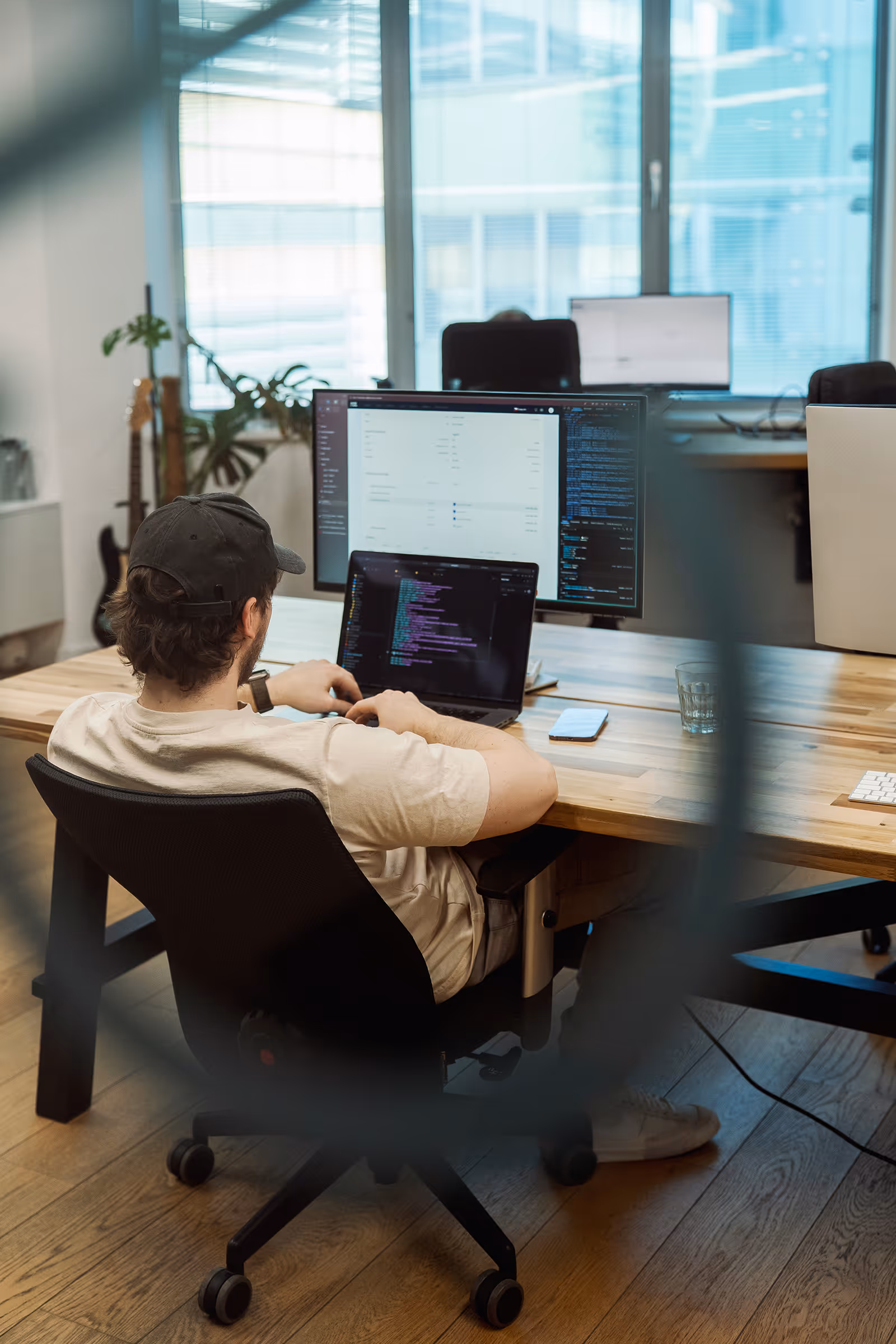 An Outloud team member working with data across software tools